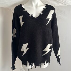 Eesome black and white lightning bolt distressed v-neck sweater